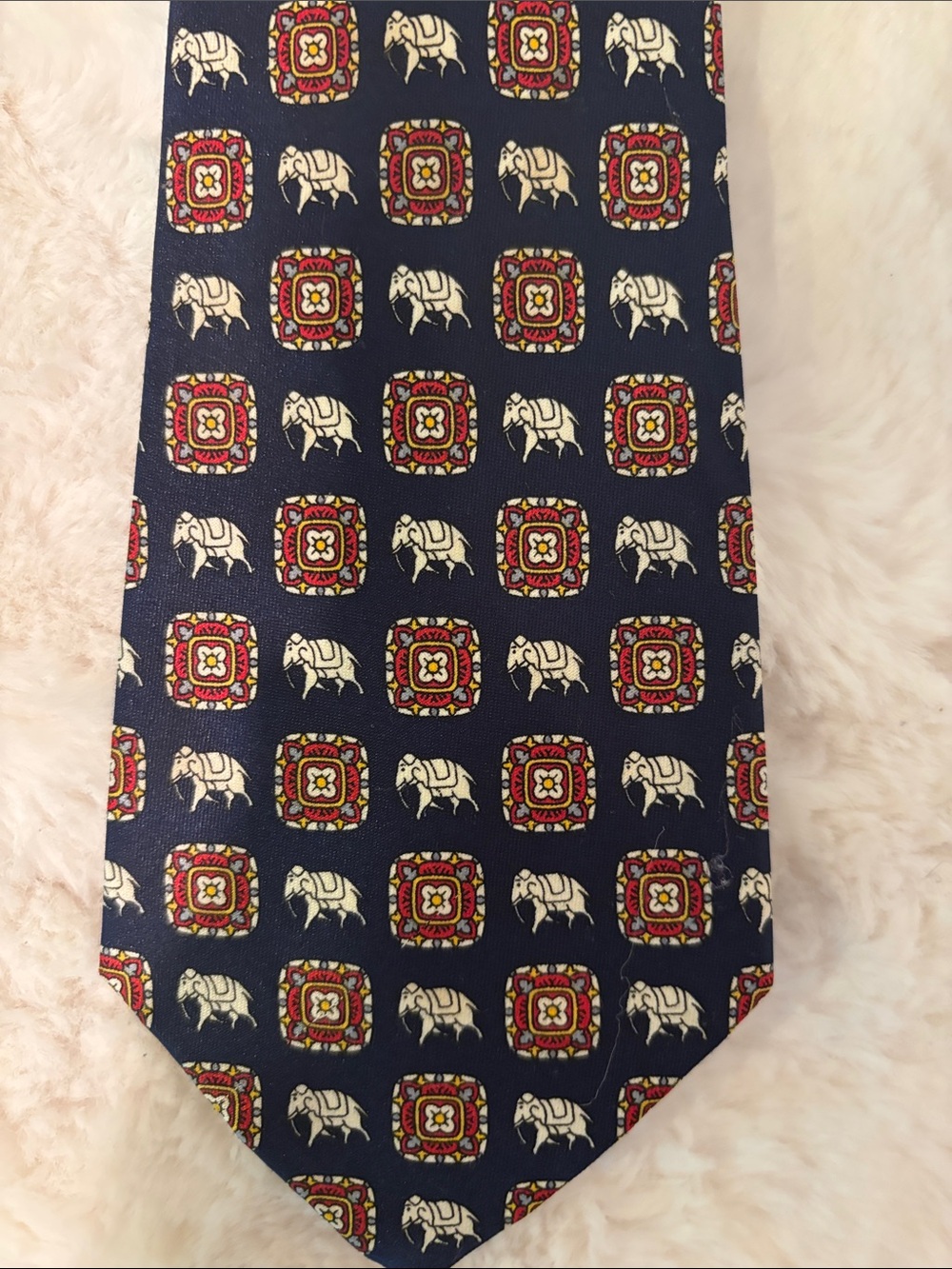 Rene Chagal Men's Silk Navy Tie with Ivory Elephant and Red Medallion Pattern